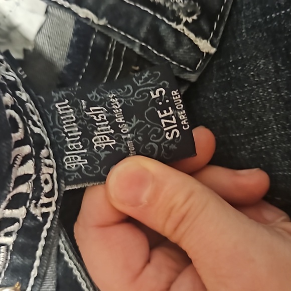 A pair of boot-cut  Platinum Plush jeans - Picture 4 of 11